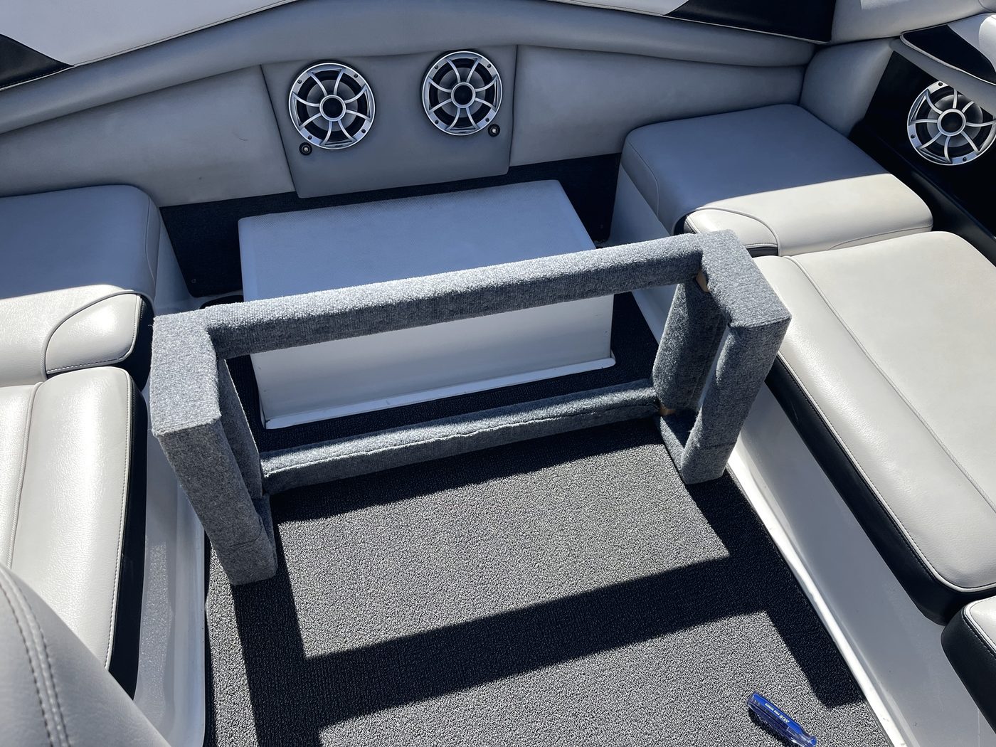 Seat base frame being test-fitted in the boat